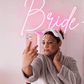 Image of a bride taking a selfie wearing the SKOON BFF Mask